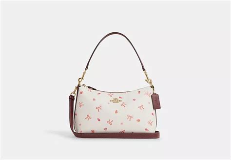 clara shoulder bag with bow print coach|coach outlet bow print.